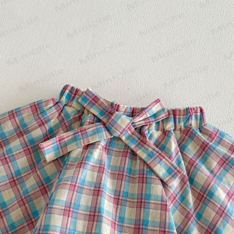 Maglietta o gonna-pantalone a quadri per bambina. - image 9