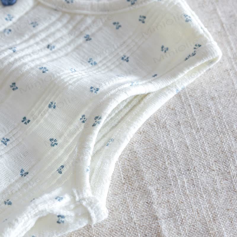 Completo da bambina con gilet e pantaloni blu a fantasia floreale. - image 5