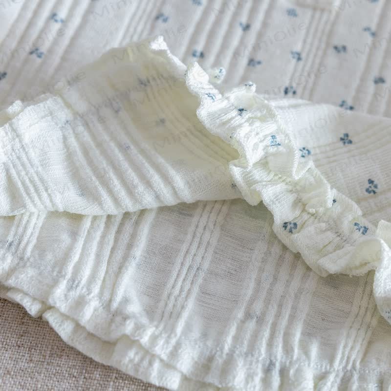 Completo da bambina con gilet e pantaloni blu a fantasia floreale. - image 6