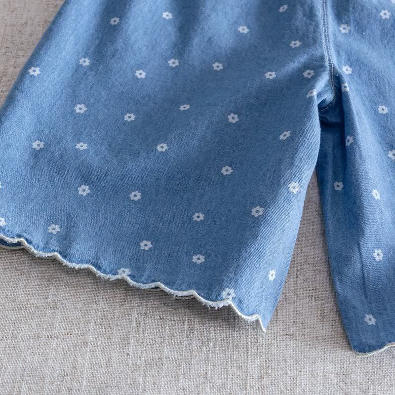 Completo da bambina con gilet e pantaloni blu a fantasia floreale. - image 7