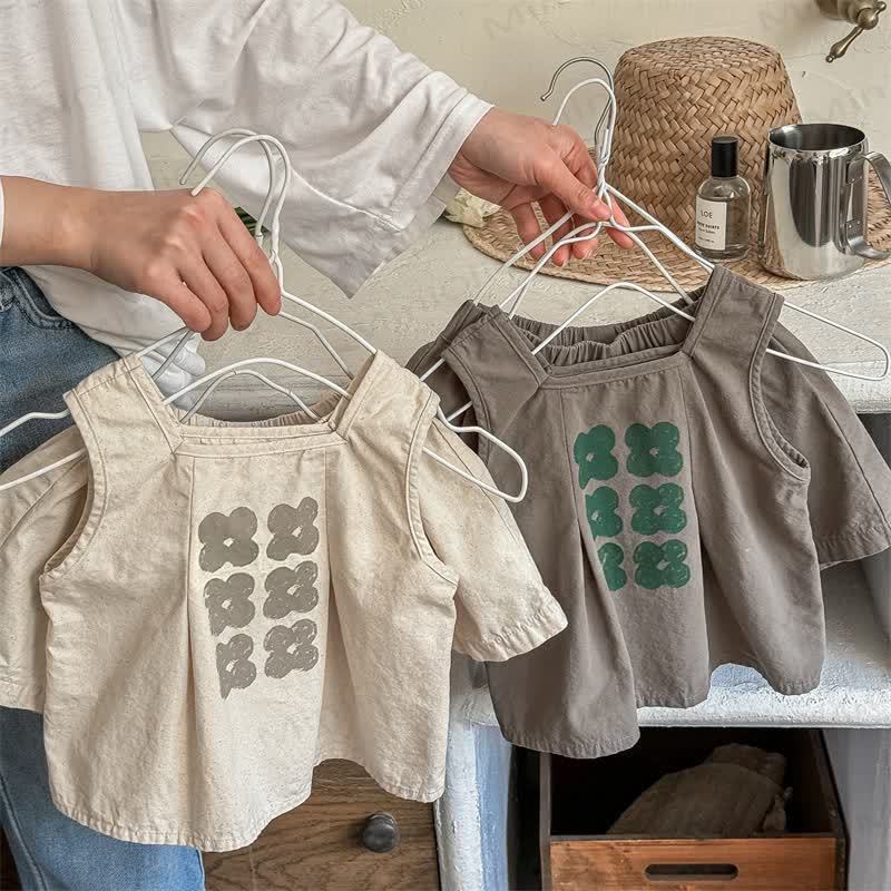 Completo da bambina composto da canotta e pantaloncini con stampa floreale. - image 1