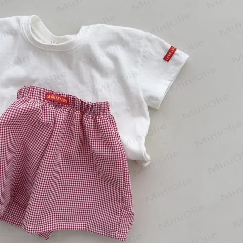 Completo per neonato composto da maglietta a tinta unita e pantaloncini a quadretti in cotone. - image 5