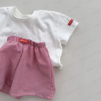 Completo per neonato composto da maglietta a tinta unita e pantaloncini a quadretti in cotone. - image 5