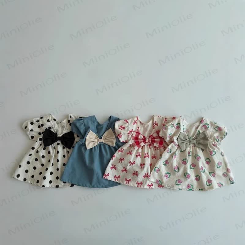 Vestitino da bambina in cotone con stampa floreale e fiocchi - image 1