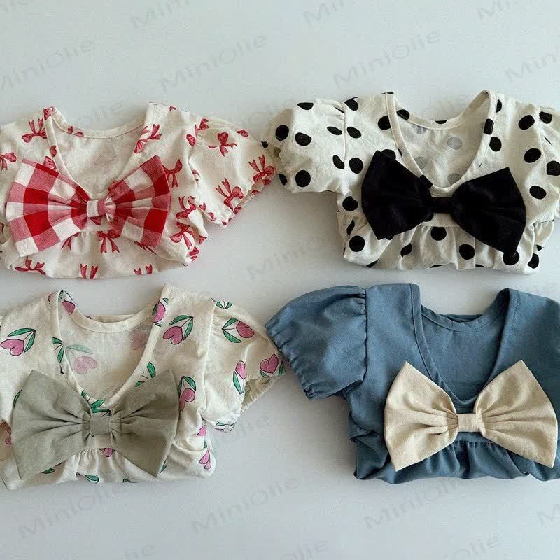 Vestitino da bambina in cotone con stampa floreale e fiocchi - image 6