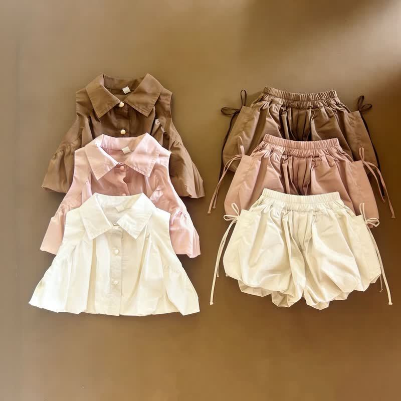Completo per bambina composto da canotta e pantaloncini in cotone a tinta unita - image 1