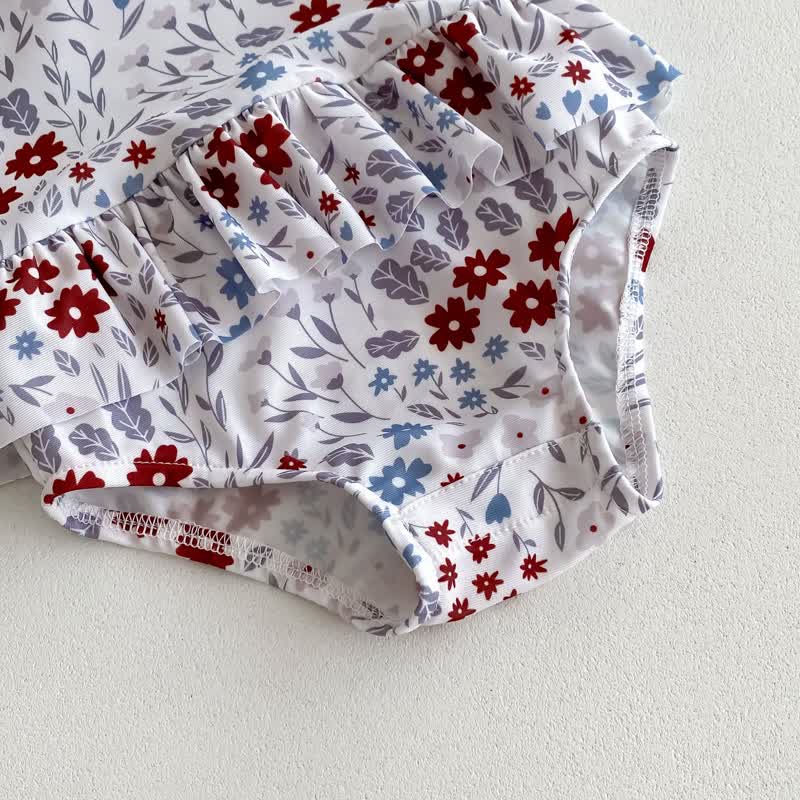 Costume intero per neonata con volant floreali e cappellino - image 5