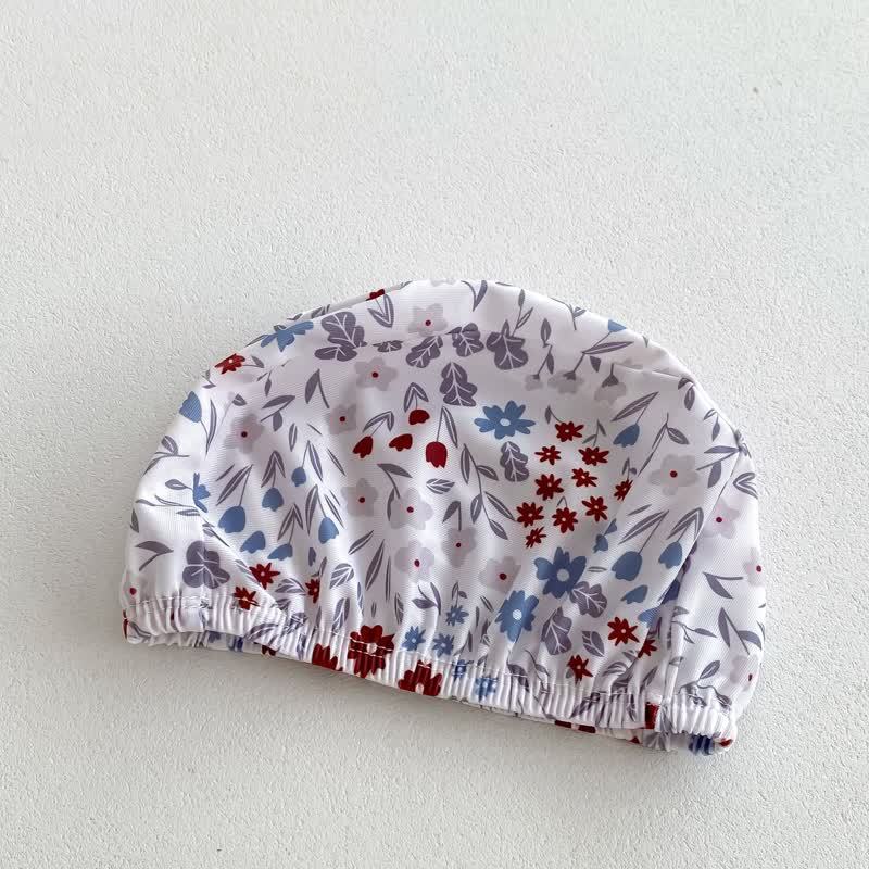 Costume intero per neonata con volant floreali e cappellino - image 6