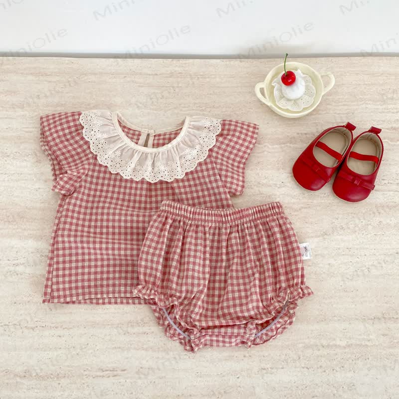 Completo da bambina composto da top e pantaloncini in pizzo a quadretti rosa. - image 1