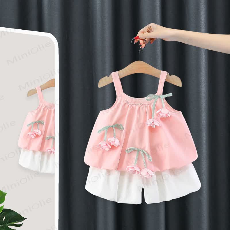 Completo da bambina composto da canotta e pantaloncini in cotone rosa con fiori. - image 1