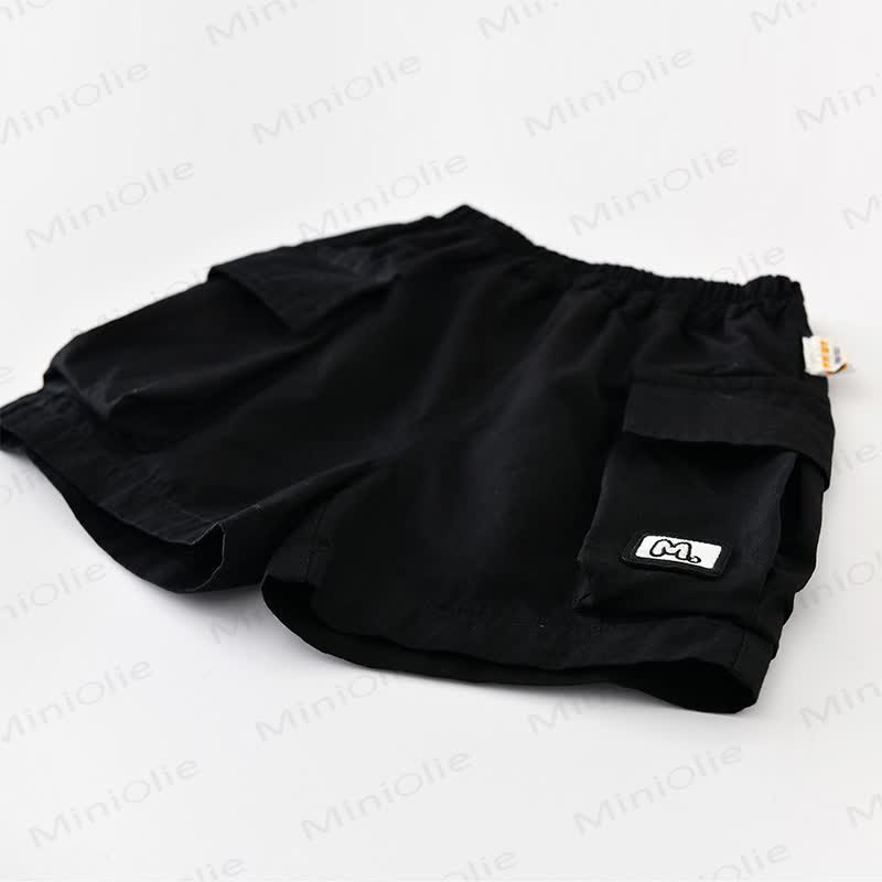 Maglietta a righe in cotone o pantaloncini neri tinta unita per neonati e bambini. - image 7