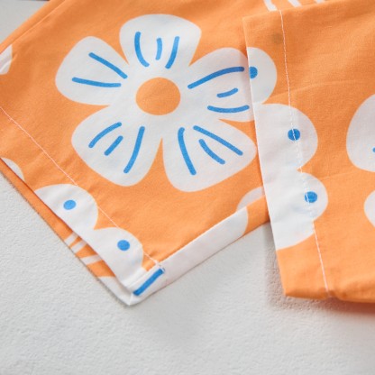Completo da bambina arancione a due pezzi senza maniche con stampa floreale. - image 6
