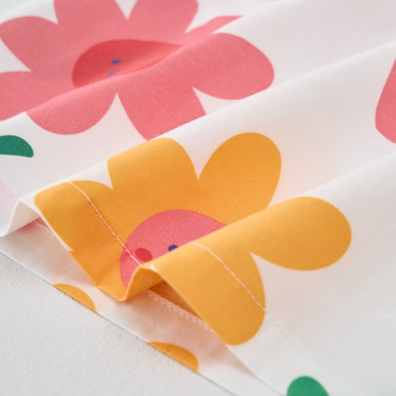 Completo da neonata/bambino senza maniche, due pezzi con stampa floreale bianca e frutta. - image 6