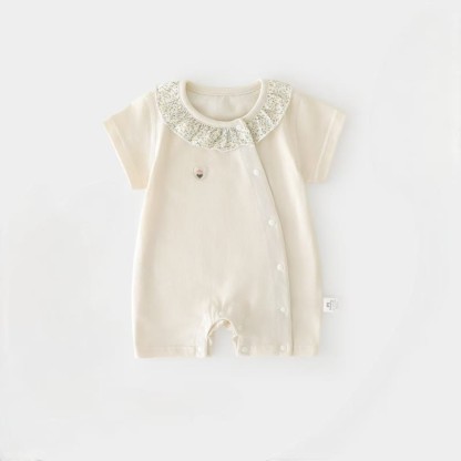 Tutina estiva da bambina con stampa floreale e colletto a volant. - Beige - 12-18 mesi - image 1