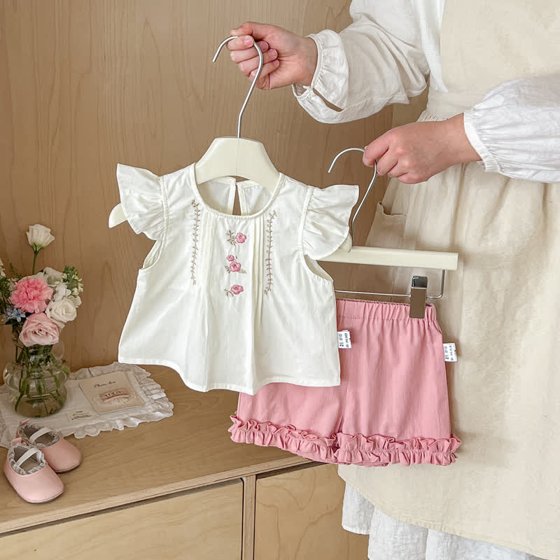 Completo due pezzi composto da top senza maniche e pantaloncini rosa chiaro con stampa floreale. - Rosa - 20-30 milioni - image 1