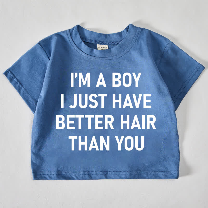 Sono un ragazzo, ho solo capelli più belli dei tuoi. Maglietta blu con slogan per bambini. - Blu - 18-24 mesi - image 1