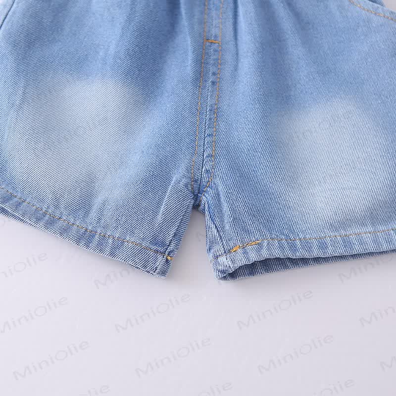 Completo da bambino composto da maglietta con stampa di cartoni animati e pantaloncini di jeans. - image 8