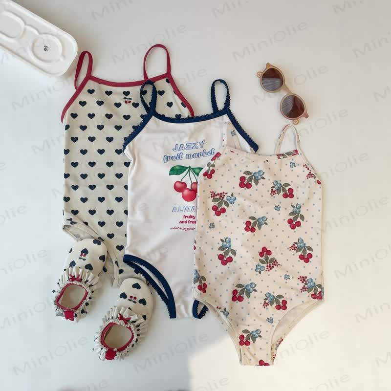 Costume da bagno a triangolo con stampa di ciliegie per bambine. - image 1