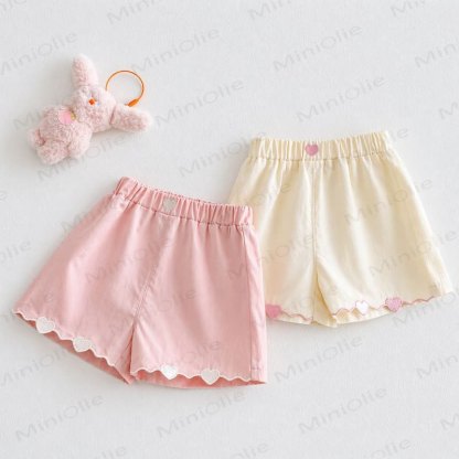 Pantaloncini da casa per bambine a tinta unita con bordo a cuoricini - image 1