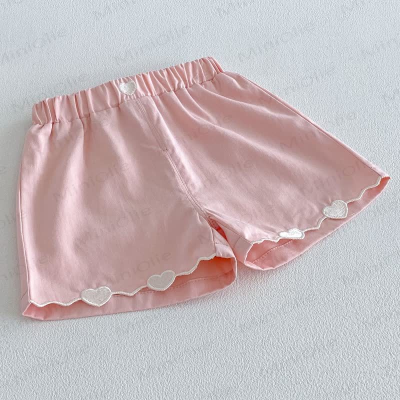Pantaloncini da casa per bambine a tinta unita con bordo a cuoricini - image 5