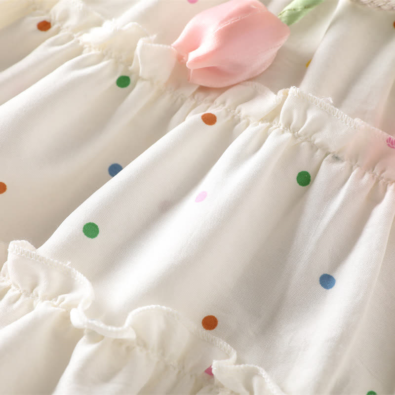 Vestitino senza maniche bianco a pois con motivo a tulipani per bambina, con borsetta inclusa. - image 6