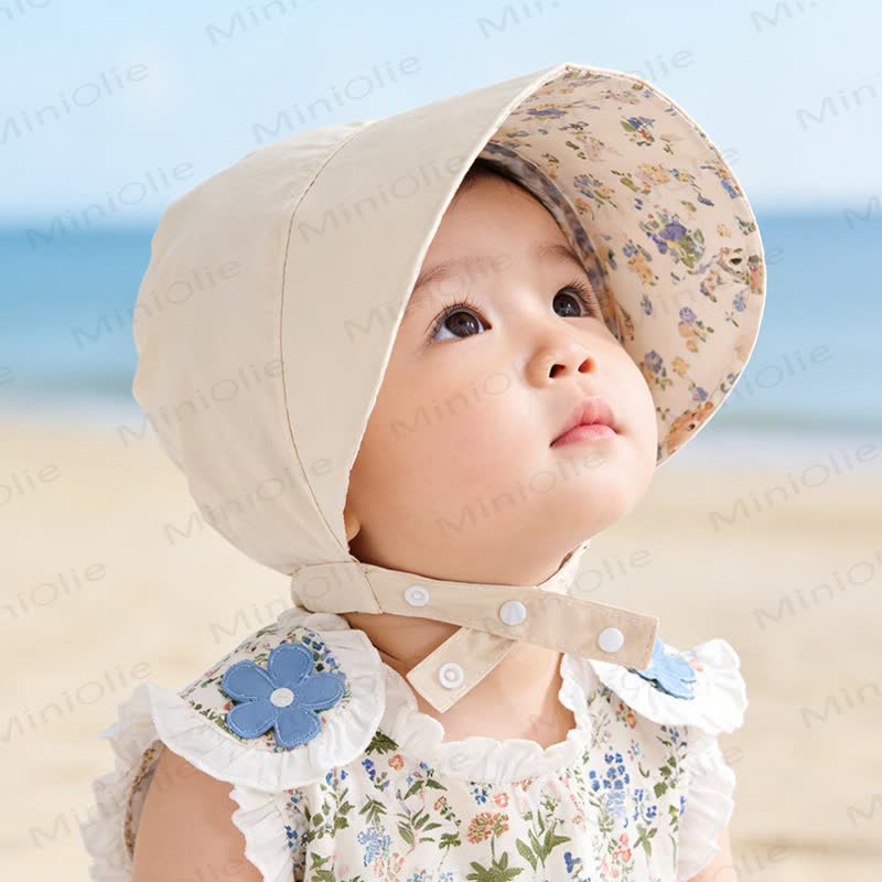 Cappellino reversibile per neonati con protezione solare - image 3