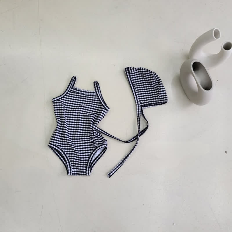 Costume da bagno intero a quadri o a pois per bambina con cuffia inclusa. - Quadri neri - 2-3T - image 2
