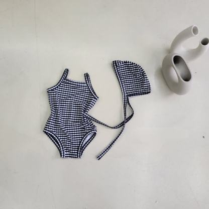 Costume da bagno intero a quadri o a pois per bambina con cuffia inclusa. - Quadri neri - 2-3T - image 2