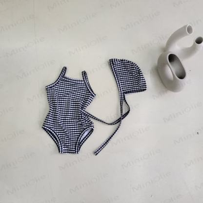 Costume da bagno intero a quadri o a pois per bambina con cuffia inclusa. - Quadri neri - 2-3T - image 2
