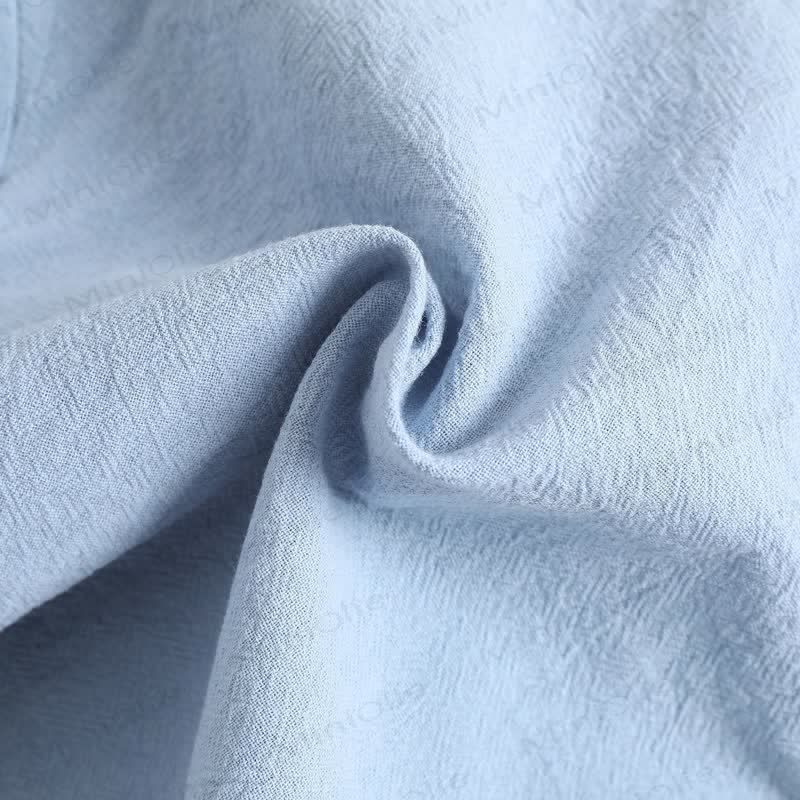 Completo da bambino in cotone e lino, composto da polo e pantaloncini in tinta unita. - image 11