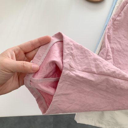 Pantaloni a gamba dritta in tessuto leggero e stropicciato per bambine. - image 6