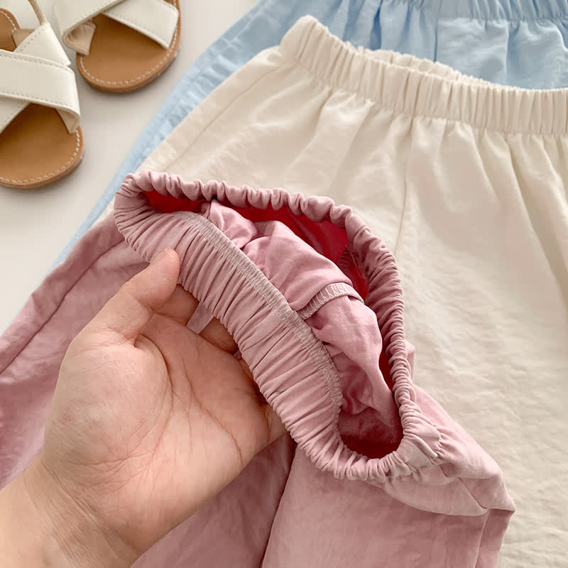 Pantaloni a gamba dritta in tessuto leggero e stropicciato per bambine. - image 7