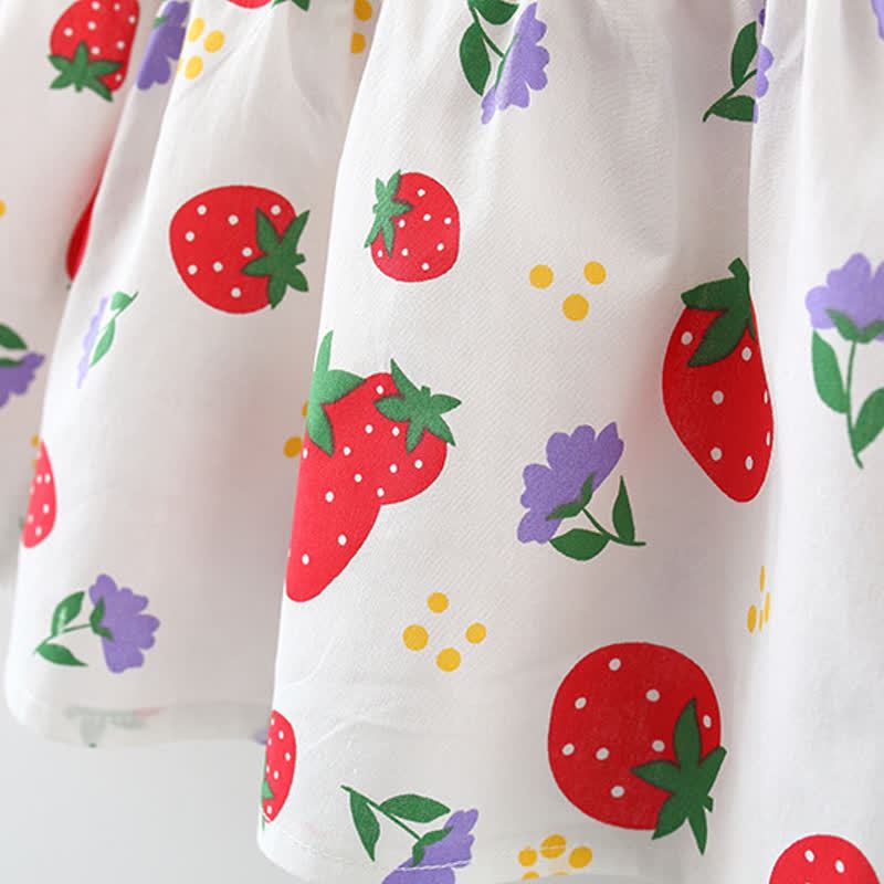 Vestitino con fiocco e stampa di fragole per bambina, completo di cappellino. - image 12