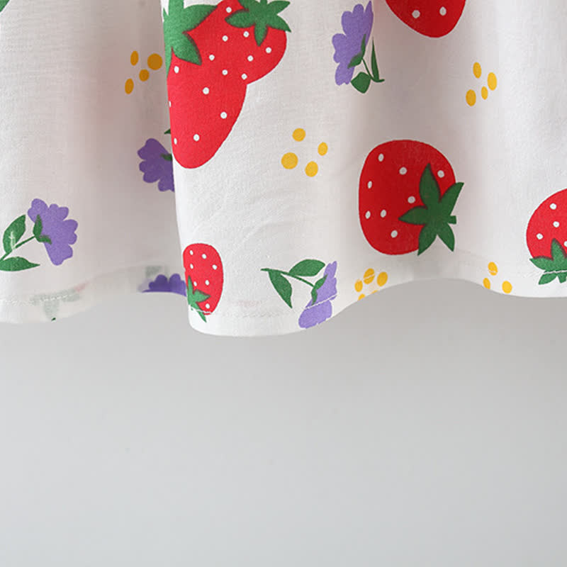 Vestitino con fiocco e stampa di fragole per bambina, completo di cappellino. - image 13