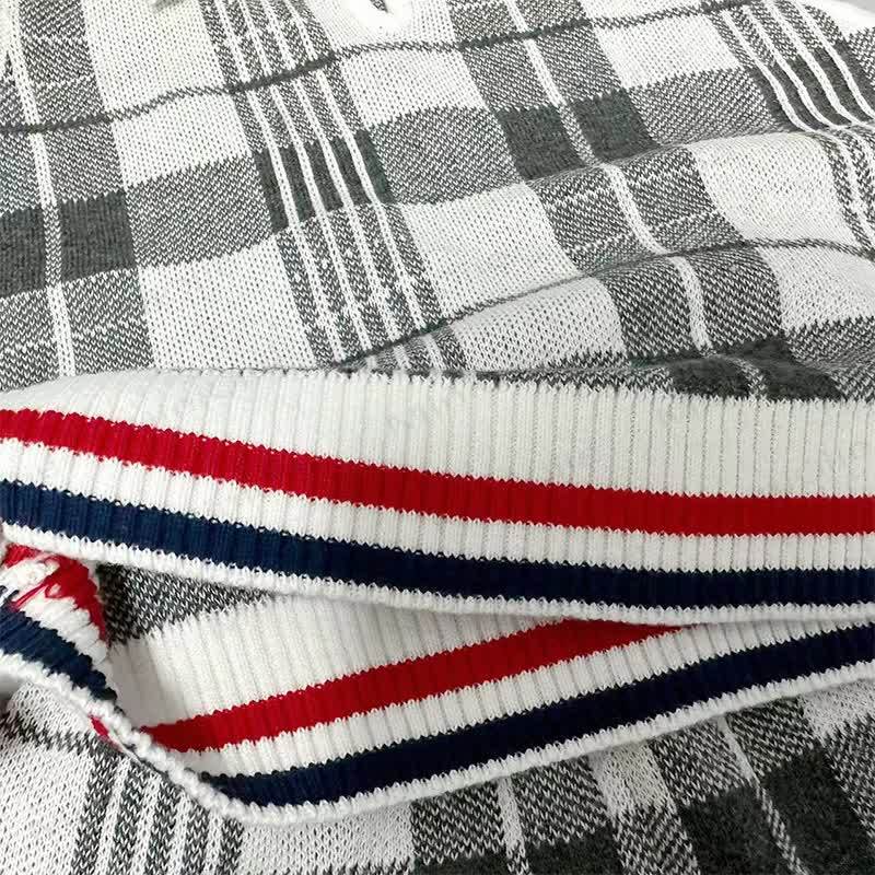 Completo da neonato/a composto da canotta con colletto e pantaloncini a quadri in maglia, due pezzi. - image 4