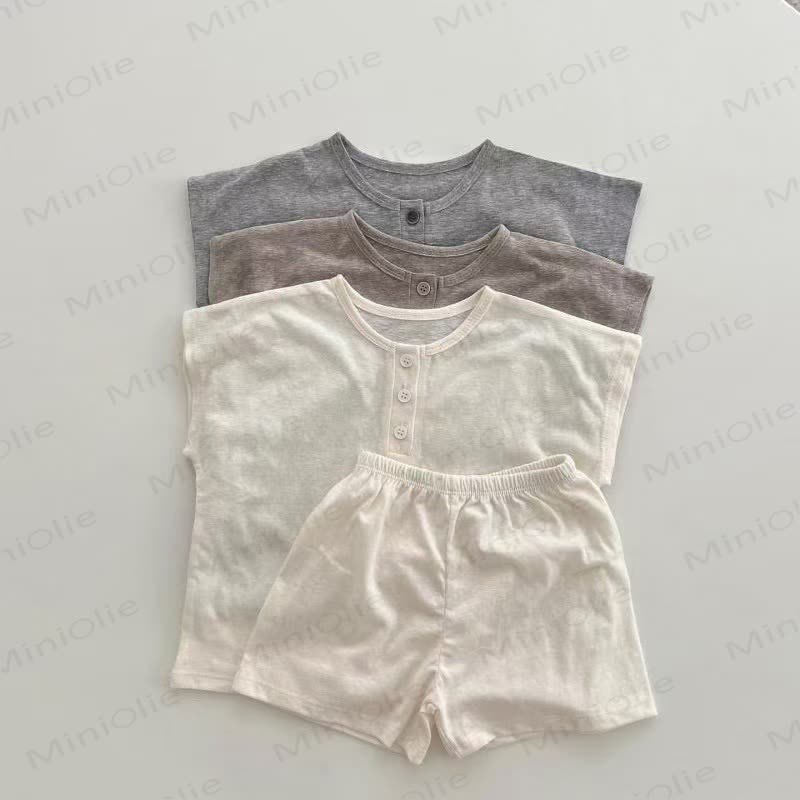 Completo due pezzi composto da canotta e pantaloncini in maglia morbidissima. - image 1