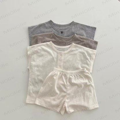 Completo due pezzi composto da canotta e pantaloncini in maglia morbidissima. - image 1