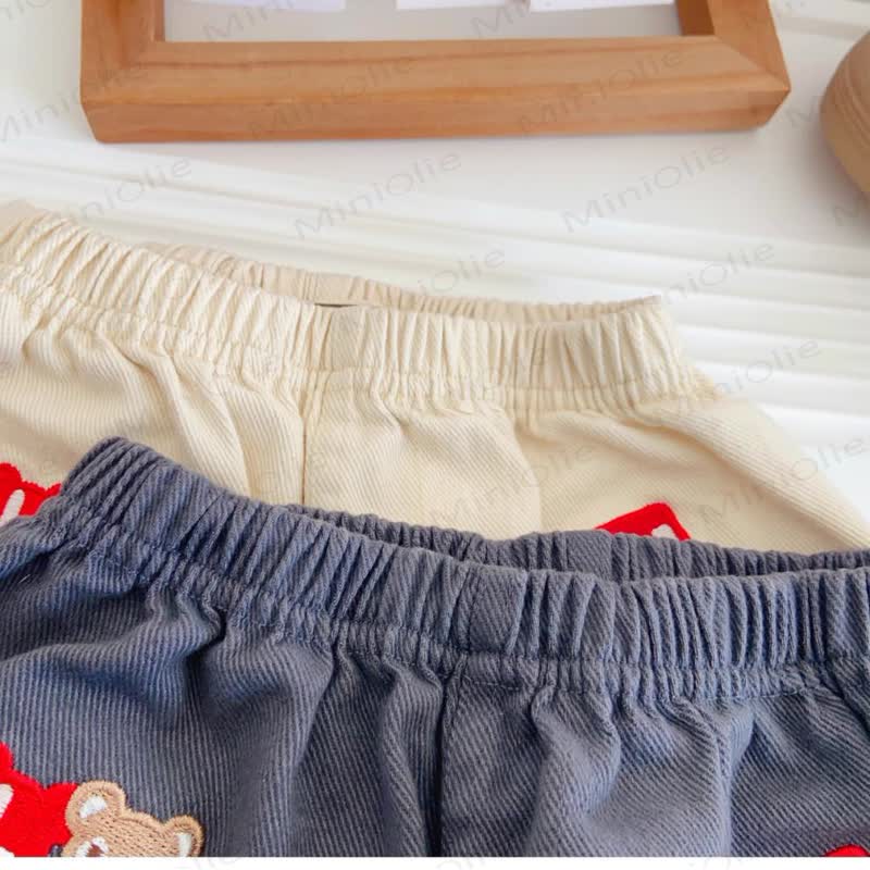 Pantaloncini da bambino con tasche applicate e disegni di animali - image 4