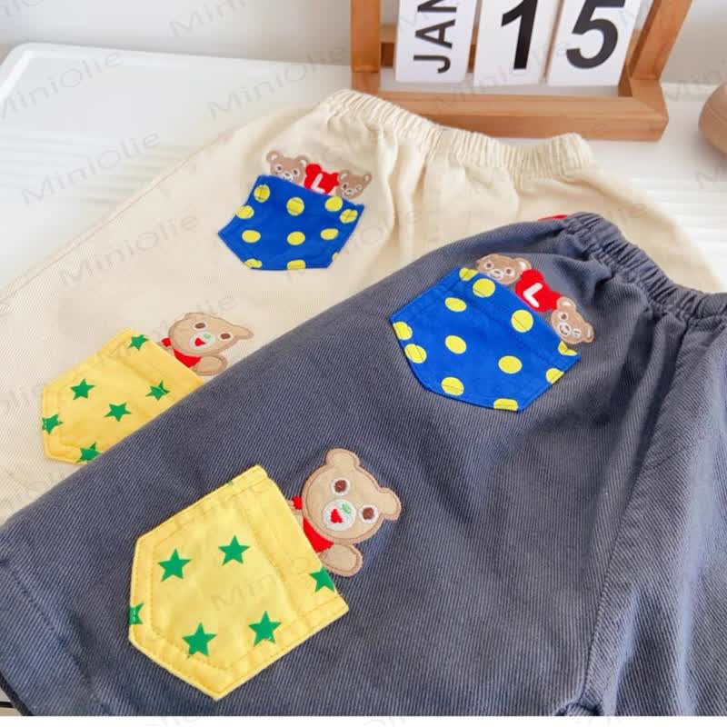 Pantaloncini da bambino con tasche applicate e disegni di animali - image 5