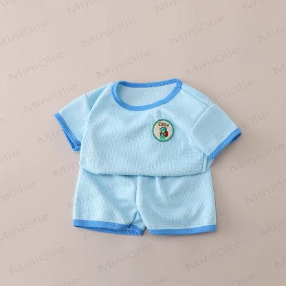 Completo per neonati e bambini composto da maglietta a nido d'ape e pantaloncini con stampa animalier. - Blu - 6-7T - image 2