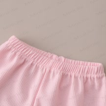 Completo per neonati e bambini composto da maglietta a nido d'ape e pantaloncini con stampa animalier. - image 8