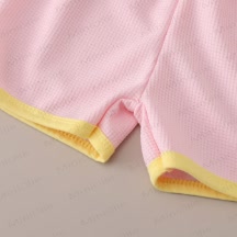 Completo per neonati e bambini composto da maglietta a nido d'ape e pantaloncini con stampa animalier. - image 9