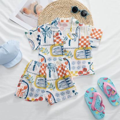 Completo per neonati e bambini piccoli con maglietta e pantaloncini con stampa a tema cibo. - image 2