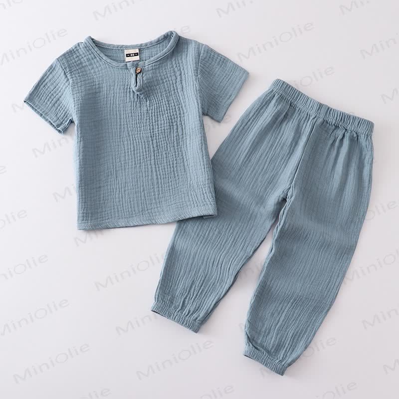 Completo per bambino composto da top e pantaloni in tinta unita con bottoni sul davanti, colore cotone. - Blu - 6-7T - image 11