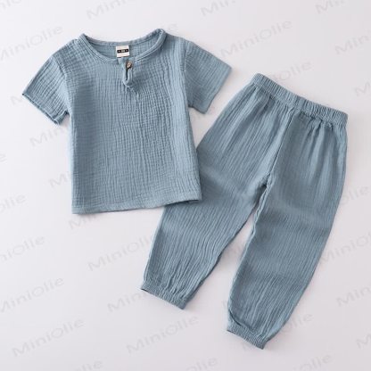 Completo per bambino composto da top e pantaloni in tinta unita con bottoni sul davanti, colore cotone. - Blu - 6-7T - image 11