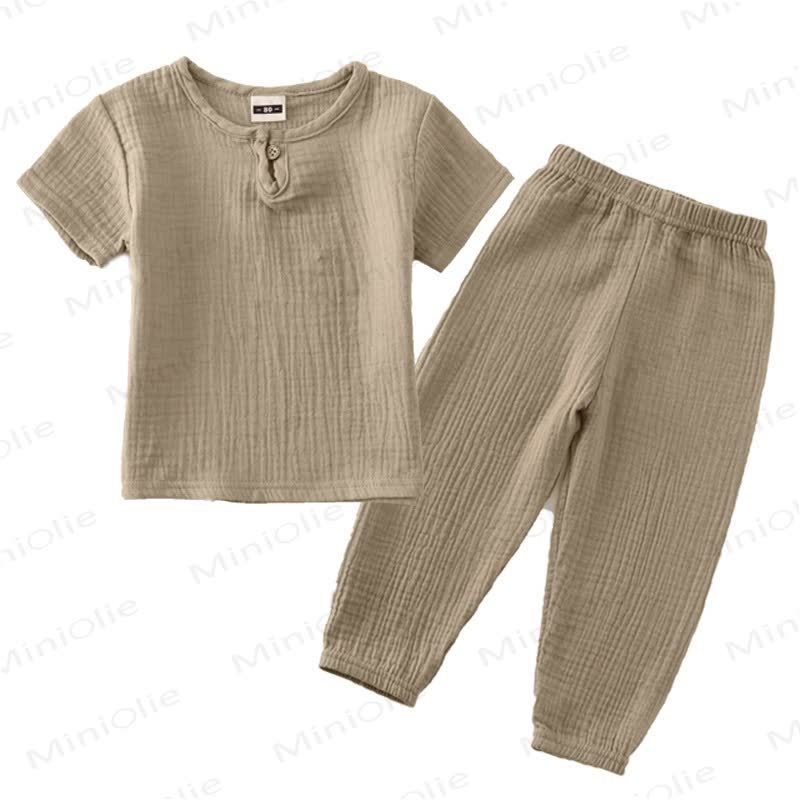 Completo per bambino composto da top e pantaloni in tinta unita con bottoni sul davanti, colore cotone. - Marrone - 6-7T - image 14