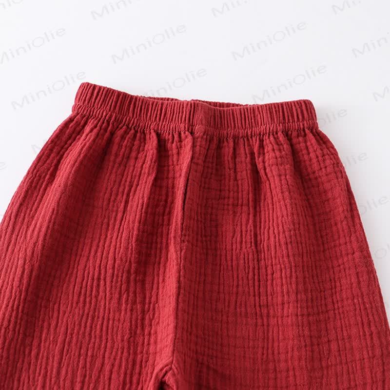 Completo per bambino composto da top e pantaloni in tinta unita con bottoni sul davanti, colore cotone. - image 15