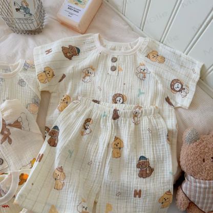 Completo per bambini composto da maglietta e pantaloncini in morbido cotone con stampa animalier. - Cane Beige - 8-9T - image 9