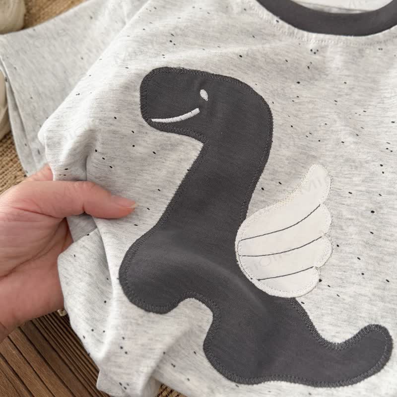 Completo da bambino in puro cotone con maglietta e pantaloncini con stampa di dinosauri. - image 6