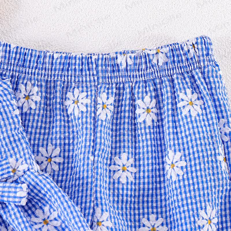 Completo due pezzi composto da canotta e pantaloni a quadretti azzurri con margherite. - image 4